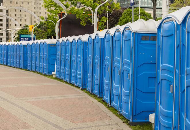a row of portable restrooms at a fairground, offering visitors a clean and hassle-free experience in loot